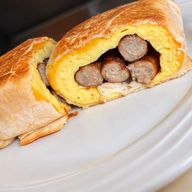 Sausage, egg and cheese wrap cut in half